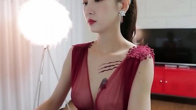 uber-sexy lady showcases her super-sexy body and thick boobs.