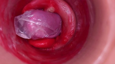 The camera inside the deep cunny records a huge climax with a stuck condom